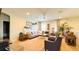 Spacious living room with ample seating, natural light, and stylish decor at 206 Yellow Snapdragon Dr, Davenport, FL 33837