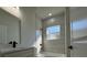 Modern bathroom with tiled shower and tub combination and matte black fixtures at 2336 Sw 168Th Loop, Ocala, FL 34473