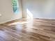 Bedroom featuring a bright window and laminate flooring at 2336 Sw 168Th Loop, Ocala, FL 34473