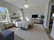 Serene main bedroom features large windows, soft carpet, and ample natural light at 2336 Sw 168Th Loop, Ocala, FL 34473