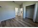 Inviting bedroom with wood-look floors and access to bath and closet at 2336 Sw 168Th Loop, Ocala, FL 34473