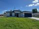 Charming single-story home boasts a well-manicured lawn and a two-car garage at 2336 Sw 168Th Loop, Ocala, FL 34473