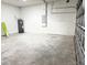 Spacious unfinished garage with cinder block walls and concrete floors at 2336 Sw 168Th Loop, Ocala, FL 34473