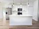 Modern kitchen featuring white cabinetry, stainless steel appliances, and a center island at 2336 Sw 168Th Loop, Ocala, FL 34473