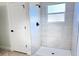 Tiled shower with glass door and a window for natural light at 2336 Sw 168Th Loop, Ocala, FL 34473