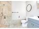 Bathroom with a walk-in shower, modern fixtures, and a stylish vanity at 2536 Nw 3Rd Ave, Ocala, FL 34475