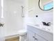 Modern bathroom featuring a stylish vanity, updated fixtures, and tiled shower at 2536 Nw 3Rd Ave, Ocala, FL 34475