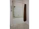 Bright bathroom featuring a shower and tub combination with neutral tile flooring at 2935 Greenwood Springs Loop, Lake Mary, FL 32746