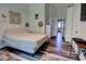 Spacious bedroom with an adjacent doorway with a view to the living room at 2935 Greenwood Springs Loop, Lake Mary, FL 32746