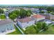 Overhead shot of backyard showcasing play area and neighborhood at 3234 Amberley Park Cir, Kissimmee, FL 34743