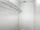 A walk-in closet with a simple wire shelving system for efficient storage at 3234 Amberley Park Cir, Kissimmee, FL 34743