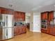 Spacious kitchen with stainless steel appliances and custom cabinets at 3234 Amberley Park Cir, Kissimmee, FL 34743