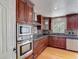 Well-equipped kitchen with custom cabinetry and stainless steel appliances at 3234 Amberley Park Cir, Kissimmee, FL 34743
