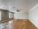 Bright and airy living room with hardwood floors and neutral decor at 3234 Amberley Park Cir, Kissimmee, FL 34743