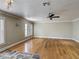 Spacious living room with hardwood floors and a neutral color scheme at 3234 Amberley Park Cir, Kissimmee, FL 34743