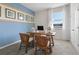 Stylish bedroom featuring a wooden desk, coastal themed decor, and bright natural light at 3318 Arch Ave, Ormond Beach, FL 32174