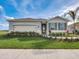 Charming single-story home featuring manicured landscaping and neutral color palette at 3318 Arch Ave, Ormond Beach, FL 32174