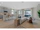 Inviting living room provides a cozy gathering space with views of the waterfront and access to the kitchen at 3318 Arch Ave, Ormond Beach, FL 32174