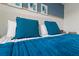 Relaxing main bedroom features plush bedding, decorative pillows, and a soothing color palette at 3318 Arch Ave, Ormond Beach, FL 32174