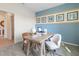 Stylish office featuring a wooden desk, coastal themed decor, and bright natural light at 3318 Arch Ave, Ormond Beach, FL 32174
