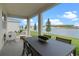 Relaxing outdoor patio with comfortable seating and scenic lake views at 3318 Arch Ave, Ormond Beach, FL 32174