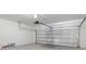 Spacious two-car garage with a garage door opener and a sealed, bright white interior ready for storage at 3326 Arch Ave, Ormond Beach, FL 32174