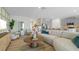 Spacious living room seamlessly flows into the kitchen, creating an open and inviting space at 3326 Arch Ave, Ormond Beach, FL 32174