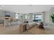Open concept living space featuring a kitchen, dining area, and comfortable seating at 3326 Arch Ave, Ormond Beach, FL 32174