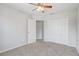 Neutral bedroom with large closet space and a ceiling fan at 3539 Foxcroft Cir, Oviedo, FL 32765