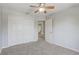 Neutral bedroom with large closet space and a ceiling fan at 3539 Foxcroft Cir, Oviedo, FL 32765