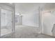 A bright, neutral bedroom with a view of a bathroom through the door at 3539 Foxcroft Cir, Oviedo, FL 32765