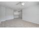 Spacious bedroom featuring neutral walls and carpet, a ceiling fan, and ample natural light at 3539 Foxcroft Cir, Oviedo, FL 32765