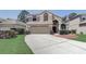 Charming two-story home with a well-manicured lawn and a spacious driveway, perfect for Gathering living at 3539 Foxcroft Cir, Oviedo, FL 32765