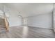 Spacious living area with ample natural light, featuring a neutral color palette and modern flooring at 3539 Foxcroft Cir, Oviedo, FL 32765