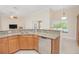 Bright and functional kitchen area with stainless steel appliances and granite countertops at 4735 Chelsea Ct, Kissimmee, FL 34744