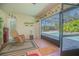 Indoor-outdoor space with tile flooring, island decor, and pool view at 4735 Chelsea Ct, Kissimmee, FL 34744