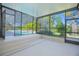 Spacious screened-in lanai with access to the pool and surrounding greenery at 4735 Chelsea Ct, Kissimmee, FL 34744