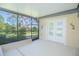 Screened-in porch with access to the pool and overlooking the backyard at 4735 Chelsea Ct, Kissimmee, FL 34744