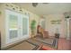 Cozy indoor-outdoor space with tiled floor, tropical decor, and pool access at 4735 Chelsea Ct, Kissimmee, FL 34744