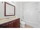 Functional bathroom with a classic vanity, toilet, and a shower-tub combination at 4785 Cumbrian Lakes Dr, Kissimmee, FL 34746