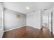 Cozy bedroom with stylish wood-style flooring and neutral color scheme at 4785 Cumbrian Lakes Dr, Kissimmee, FL 34746