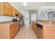 Eat-in kitchen featuring stainless steel appliances, ample counter space and easy access to additional living areas at 4785 Cumbrian Lakes Dr, Kissimmee, FL 34746