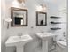 Bright bathroom features a dual sink vanity and classic tile work at 4806 Gallant Ln, Orlando, FL 32821