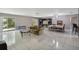 Open living room with lots of floor space, a tile floor, and natural lighting at 4806 Gallant Ln, Orlando, FL 32821