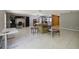 Open living room with tile floors features lots of floor space and open layout at 4806 Gallant Ln, Orlando, FL 32821