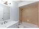Bright bathroom with tiled shower, white vanity, and modern fixtures at 4878 Tangerine Ave # 4878, Winter Park, FL 32792