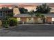 Cozy townhome featuring a well-maintained facade, neat landscaping, and private parking at 4878 Tangerine Ave # 4878, Winter Park, FL 32792