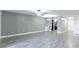 Open living space showcasing laminate flooring and neutral wall color at 4878 Tangerine Ave # 4878, Winter Park, FL 32792