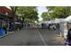 Charming street with market stalls and vendors, creating a vibrant shopping atmosphere at 4878 Tangerine Ave # 4878, Winter Park, FL 32792