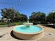 Picturesque water fountain surrounded by benches in park setting at 4878 Tangerine Ave # 4878, Winter Park, FL 32792